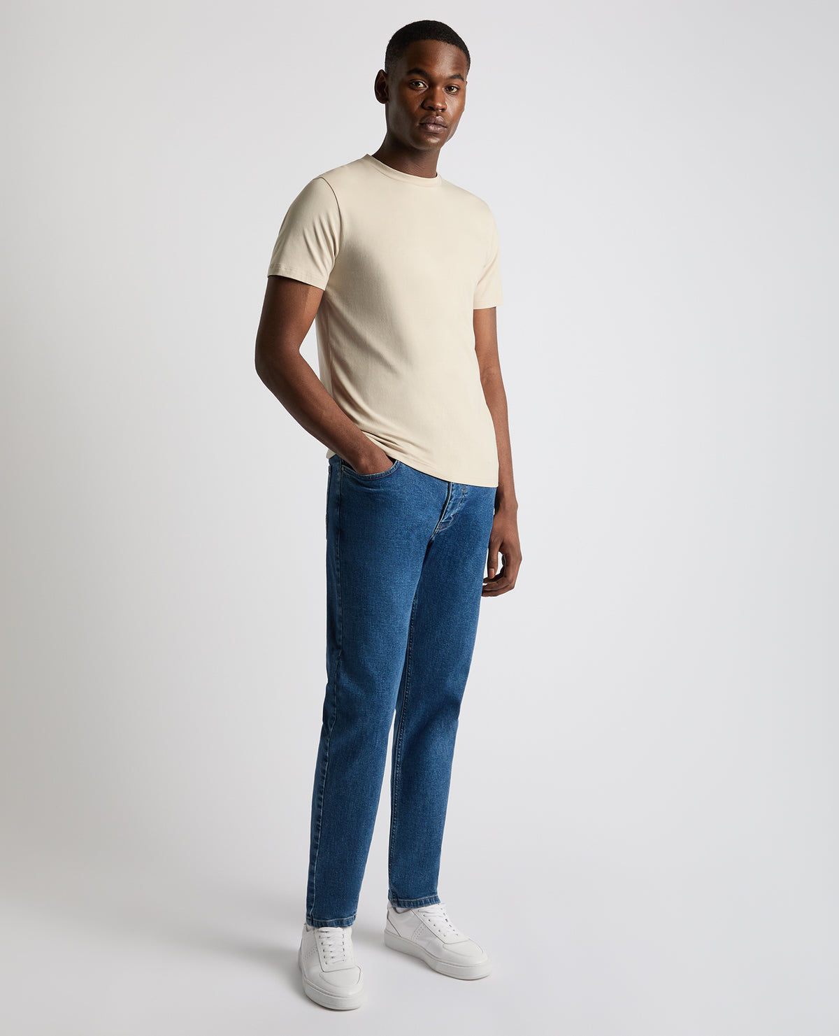 Man wearing a sand Relaxed Fit Crew Neck Tencel T-Shirt