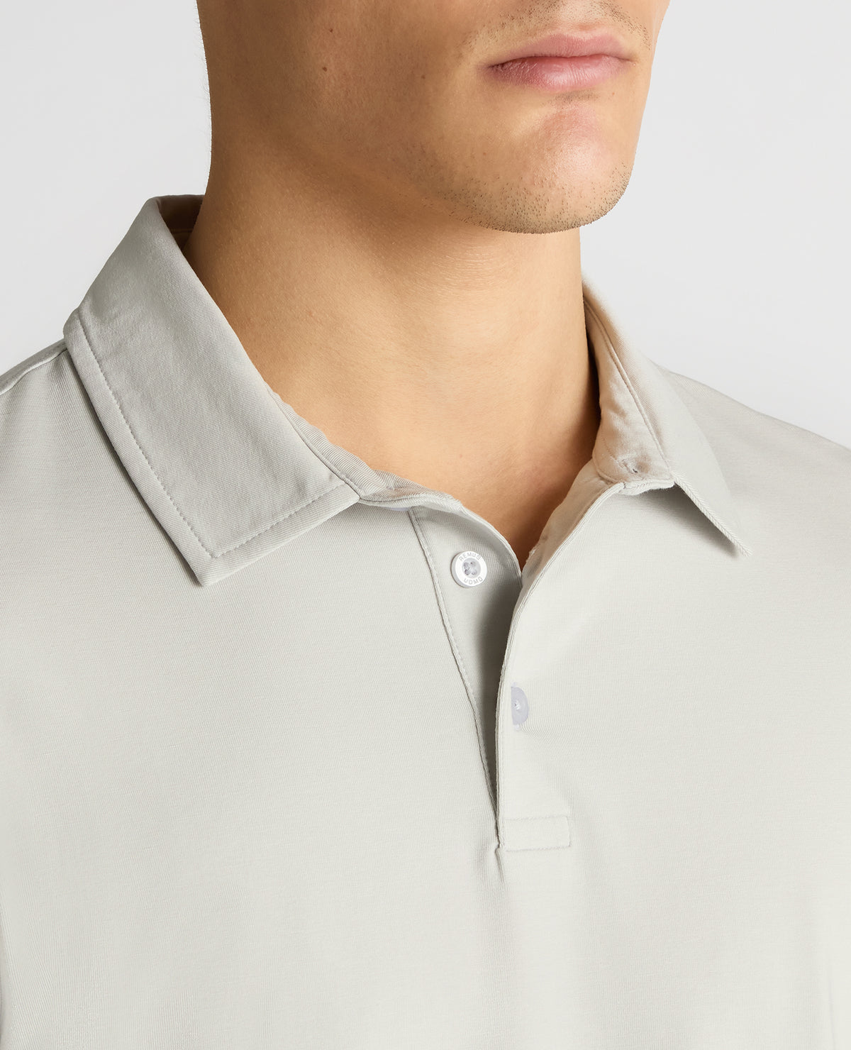 Man wearing a grey Relaxed Fit Tencel Polo