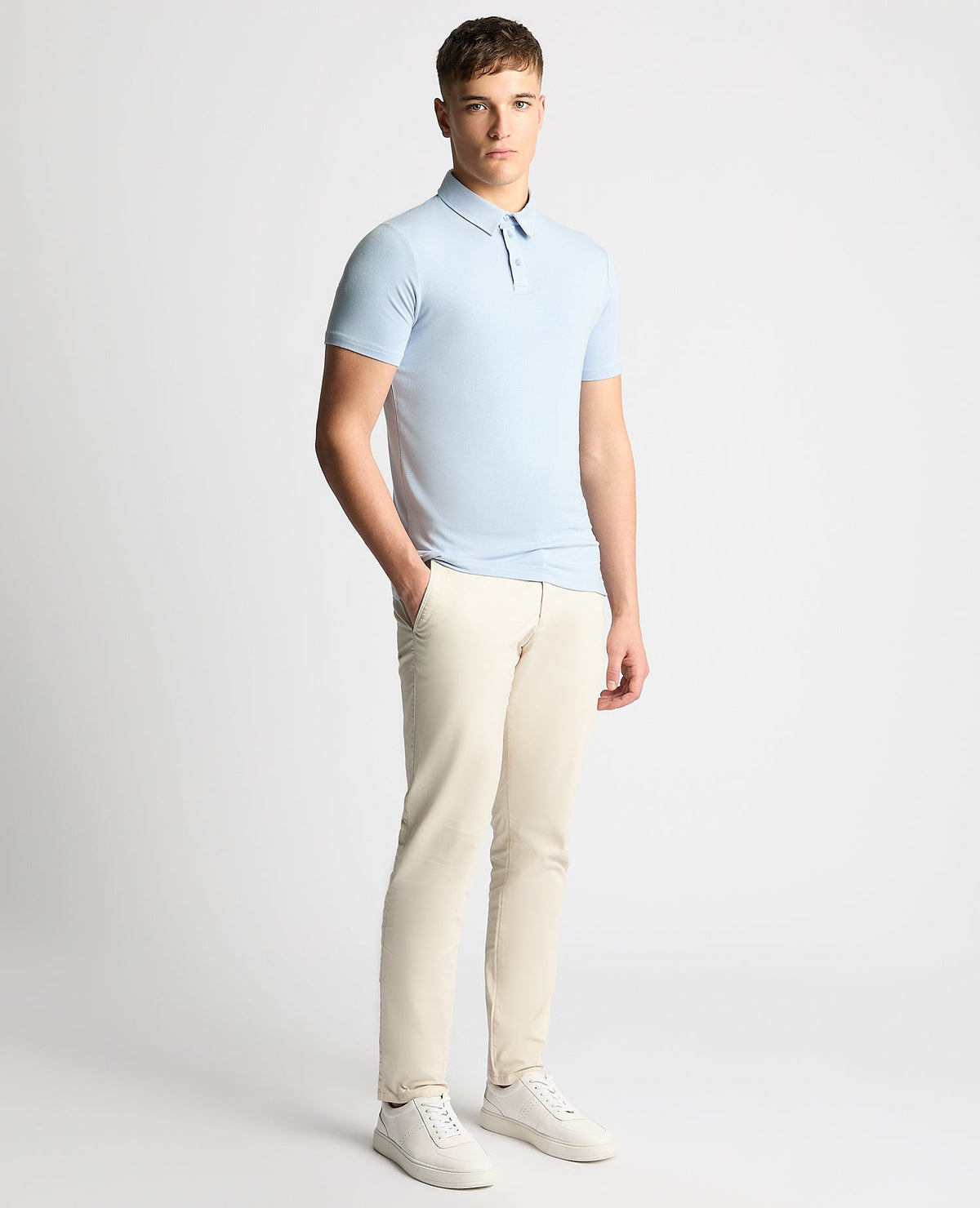 Man wearing a blue Relaxed Fit Tencel Polo