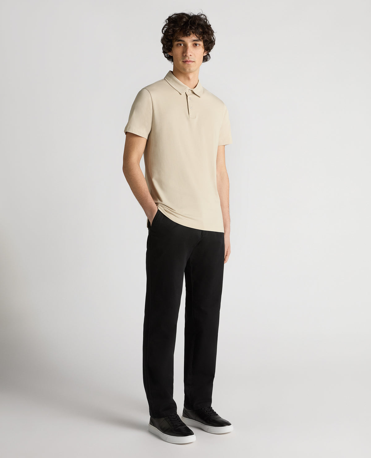 Man wearing a sand Relaxed Fit Tencel Polo