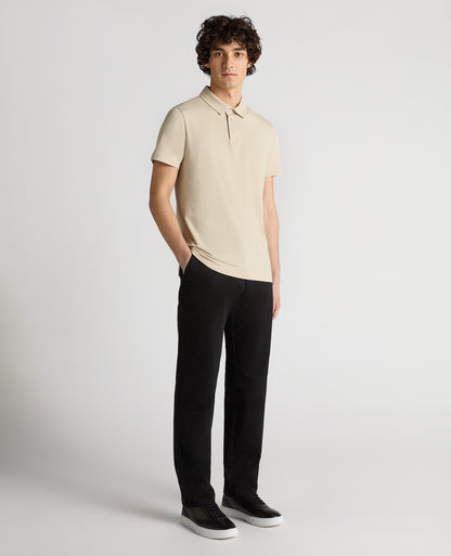 Man wearing a sand Relaxed Fit Tencel Polo