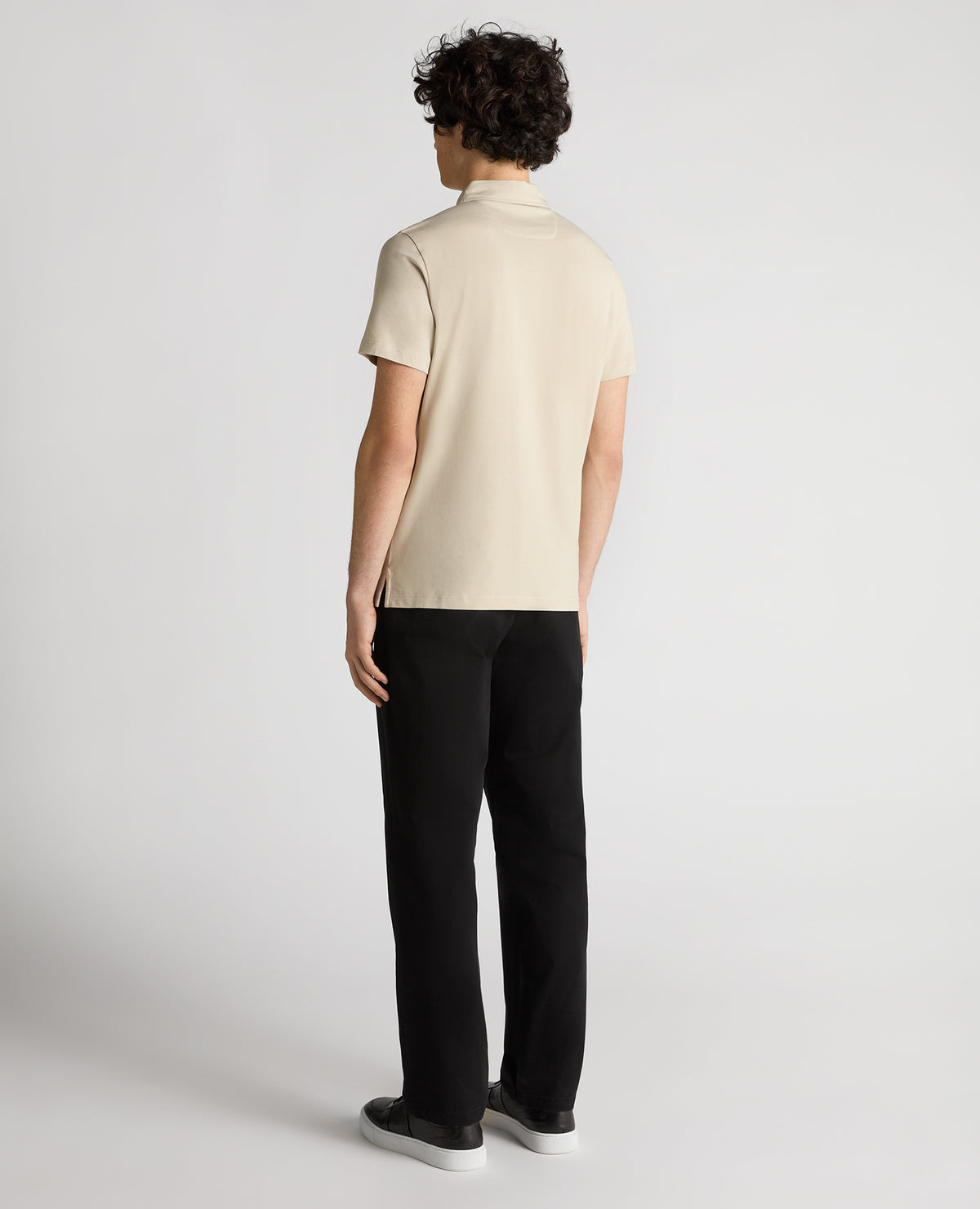Man wearing a sand Relaxed Fit Tencel Polo