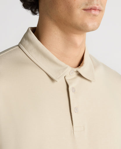 Man wearing a sand Relaxed Fit Tencel Polo