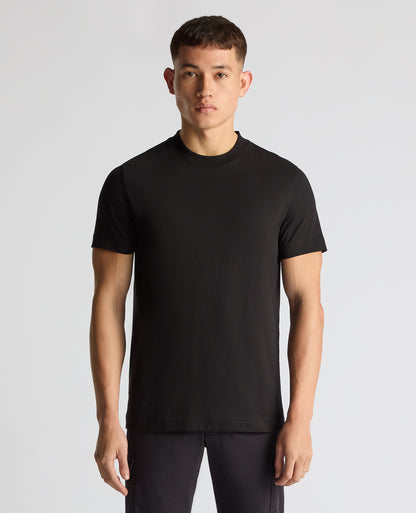 Man wearing a black Regular Fit Organic Cotton T-Shirt
