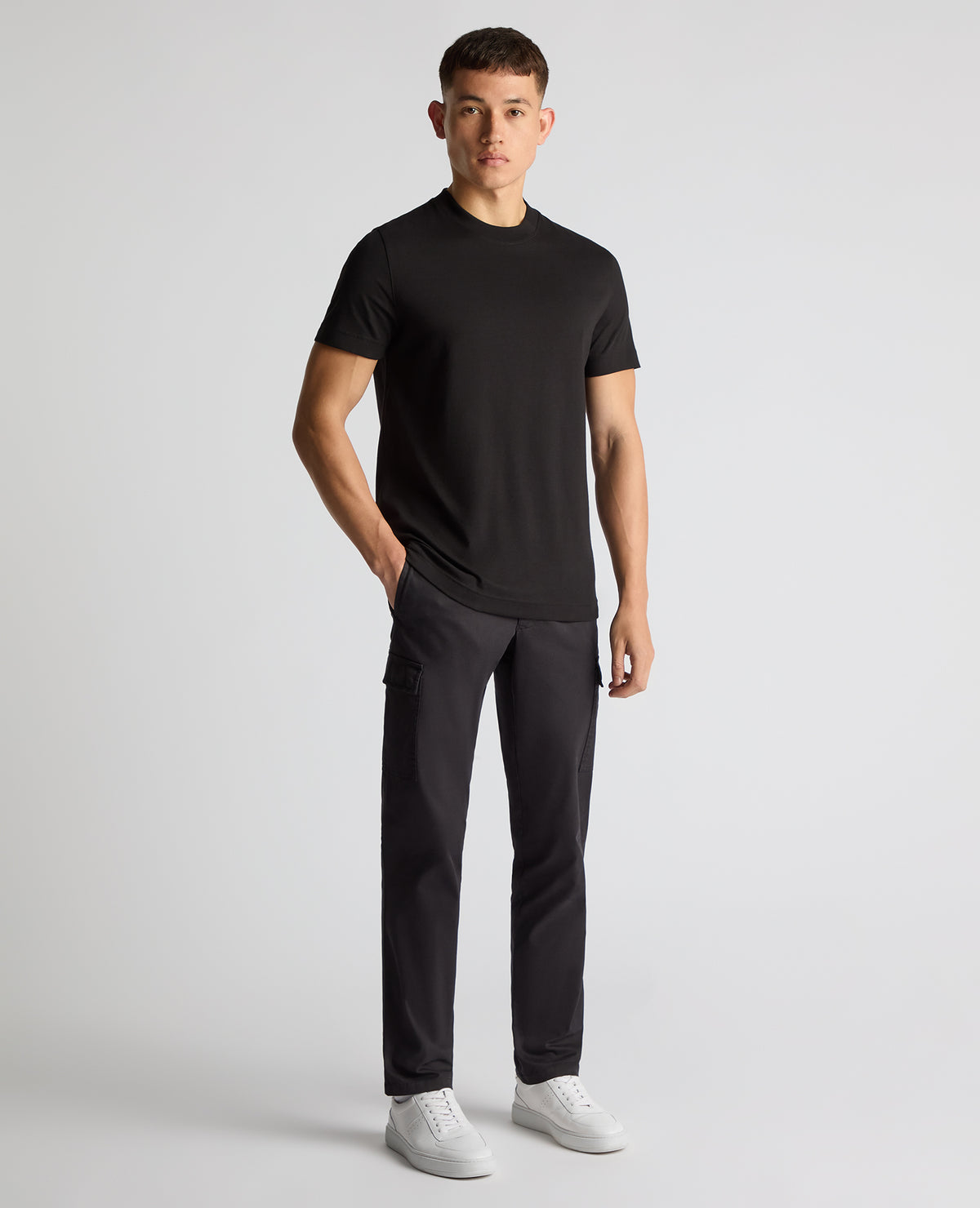 Man wearing a black Regular Fit Organic Cotton T-Shirt