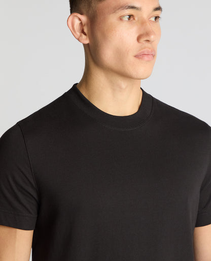 Man wearing a black Regular Fit Organic Cotton T-Shirt
