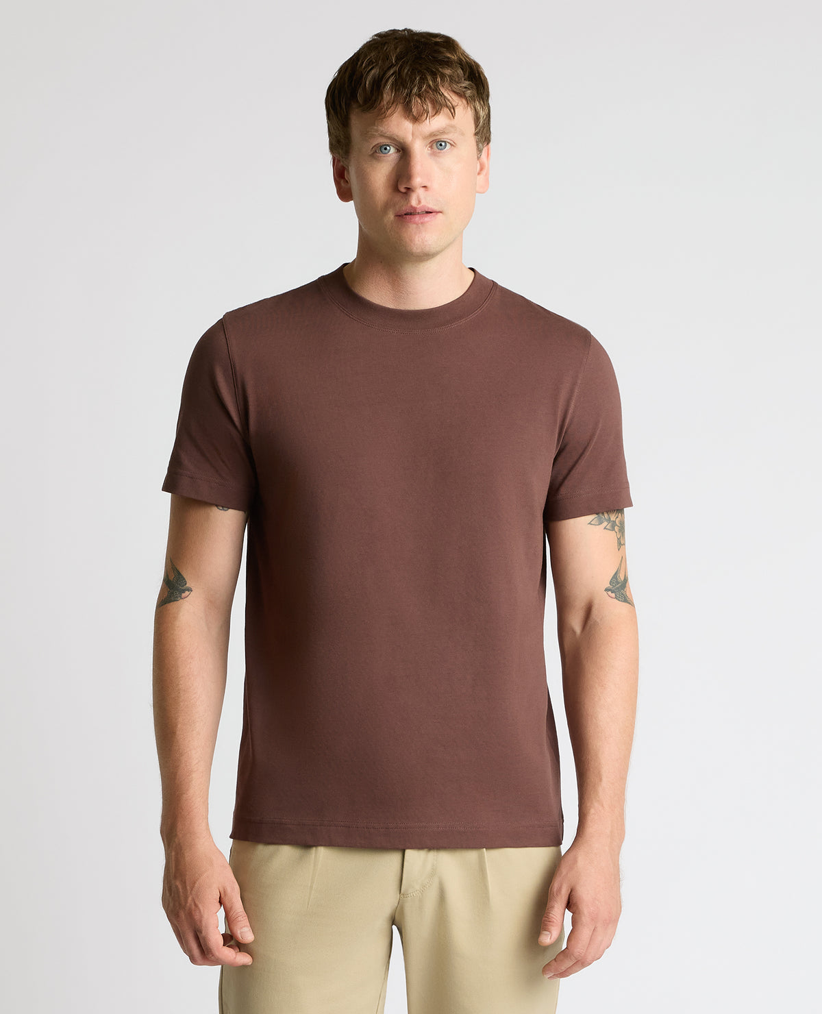 Man wearing a brown Relaxed Fit Organic Cotton T-Shirt