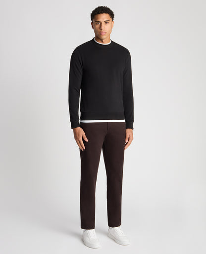Man wearing a black Tapered Fit Soft Touch Cotton-Blend Sweatshirt