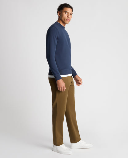 Man wearing a blue Tapered Fit Soft Touch Cotton-Blend Sweatshirt