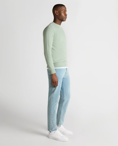 Man wearing a green Tapered Fit Soft Touch Cotton-Blend Sweatshirt
