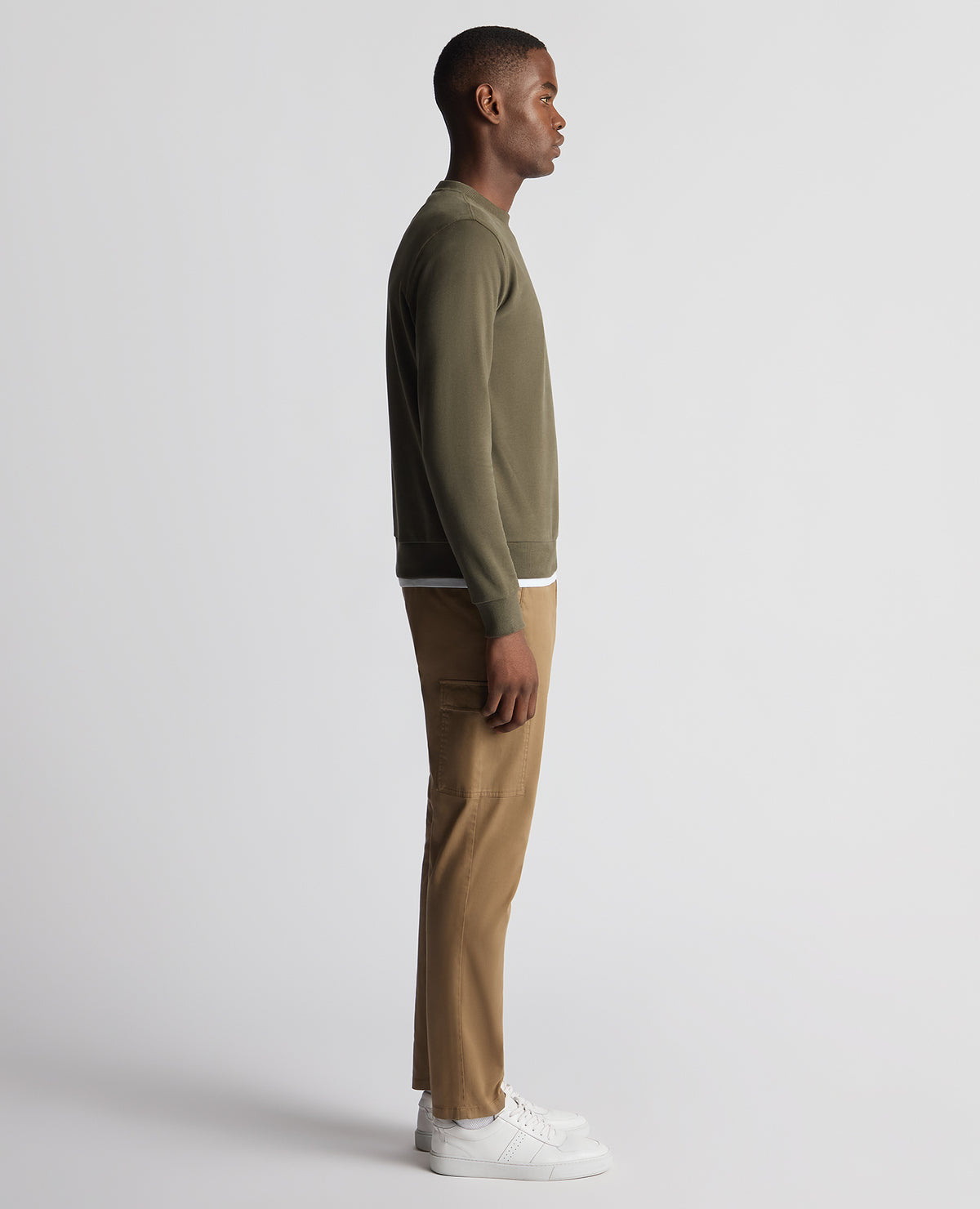 Man wearing a green Tapered Fit Soft Touch Cotton-Blend Sweatshirt