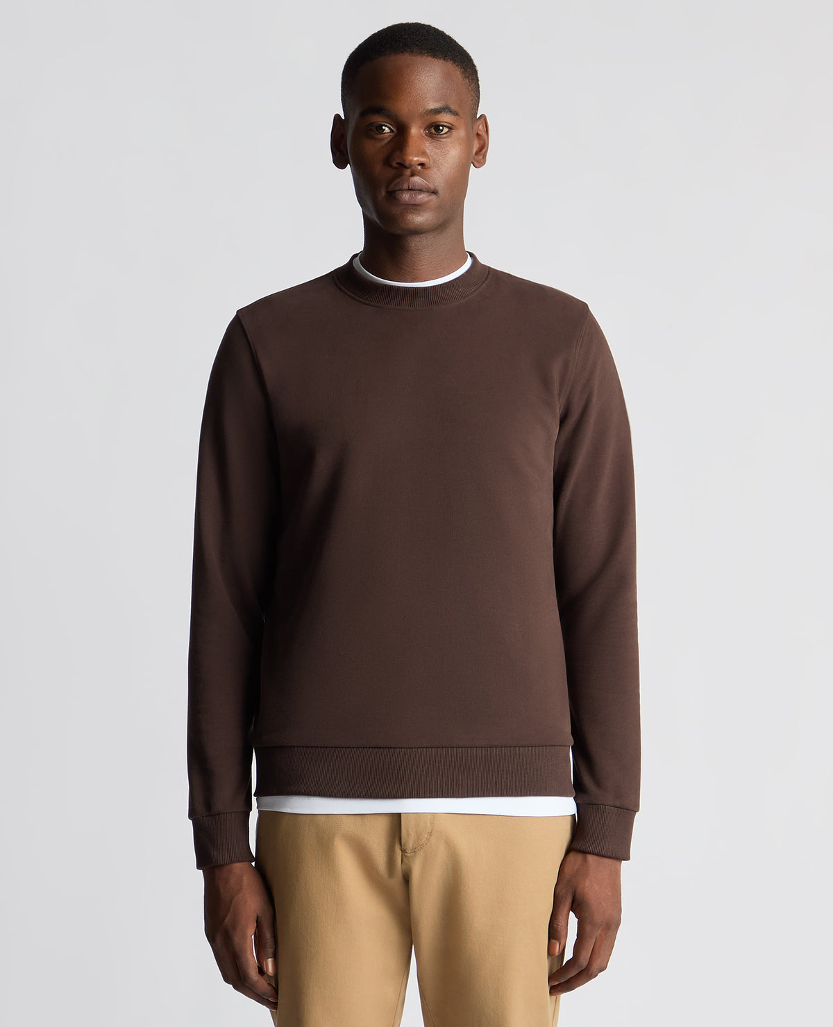 Man wearing a brown Tapered Fit Soft Touch Cotton-Blend Sweatshirt