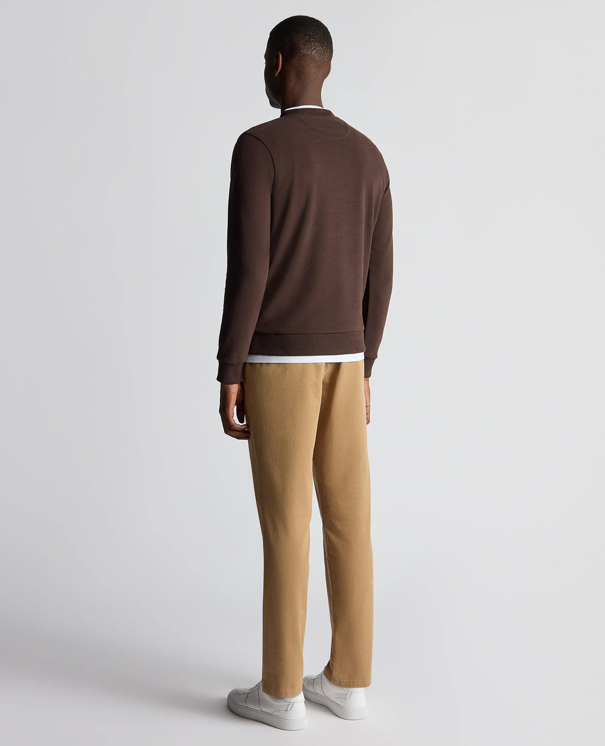 Man wearing a brown Tapered Fit Soft Touch Cotton-Blend Sweatshirt