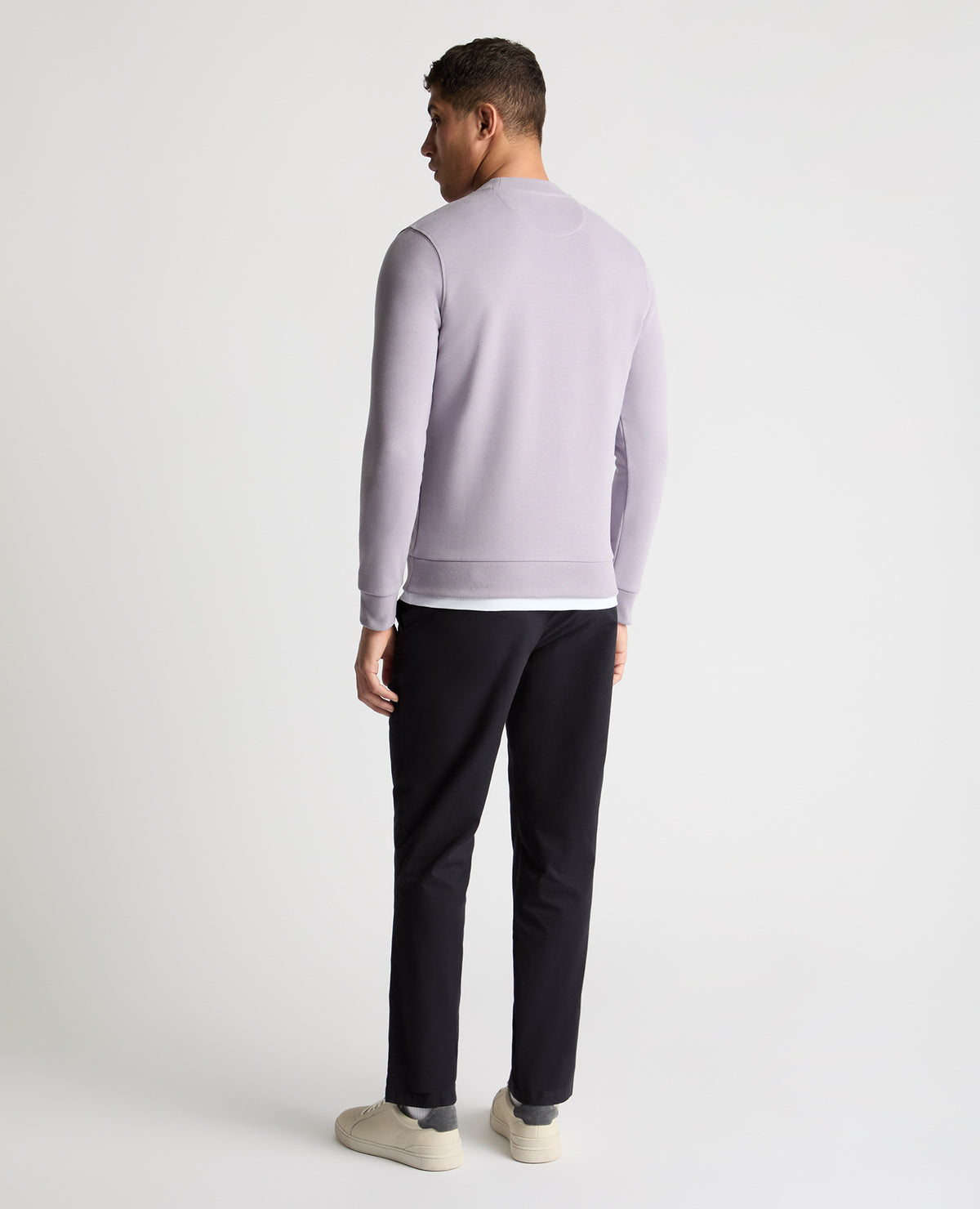 Man wearing a purple  jumper