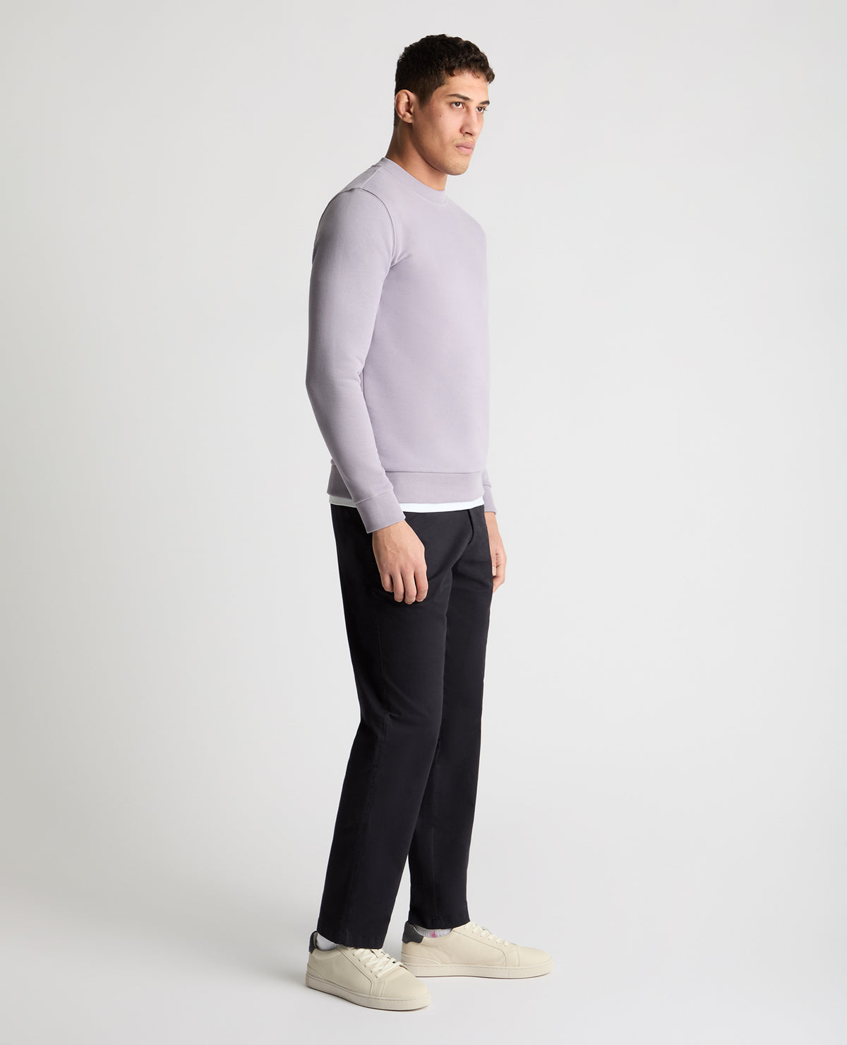 Man wearing a purple  jumper