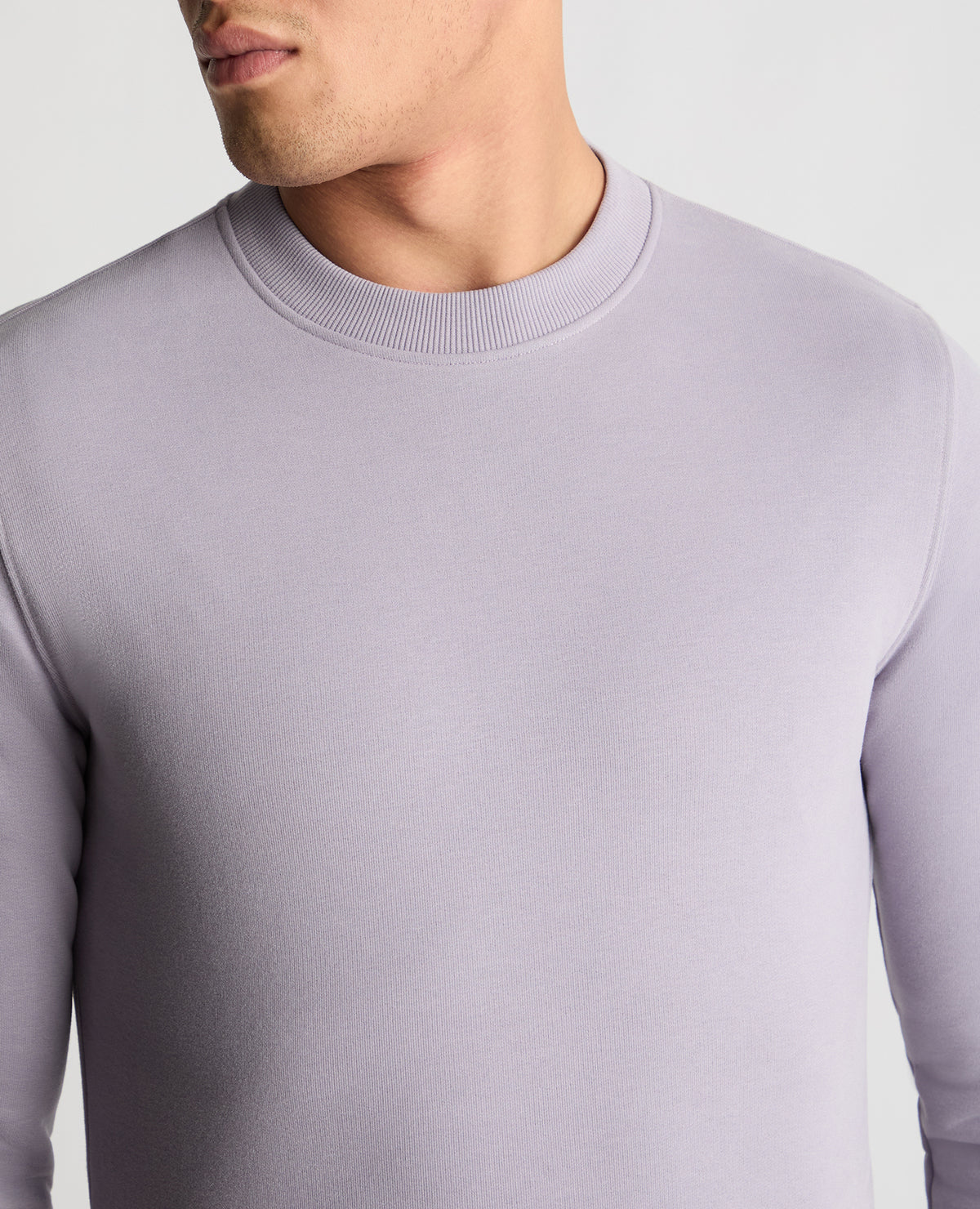 Man wearing a purple  jumper