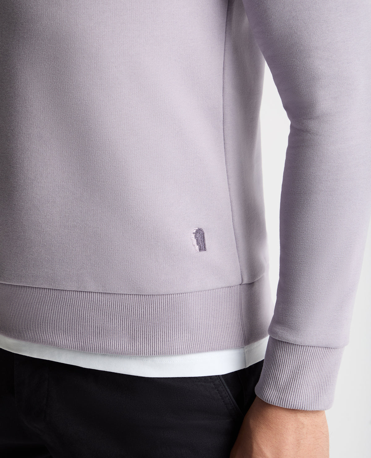 Man wearing a purple  jumper