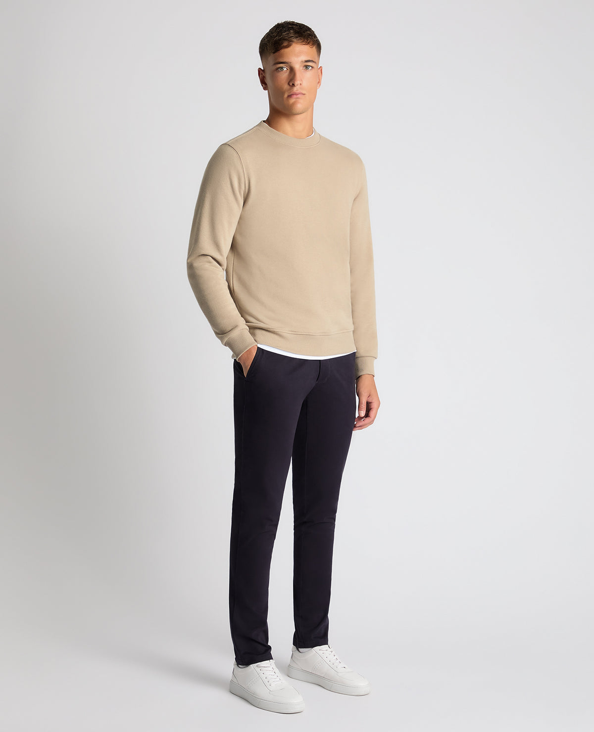 Man wearing a sand Tapered Fit Soft Touch Cotton-Blend Sweatshirt