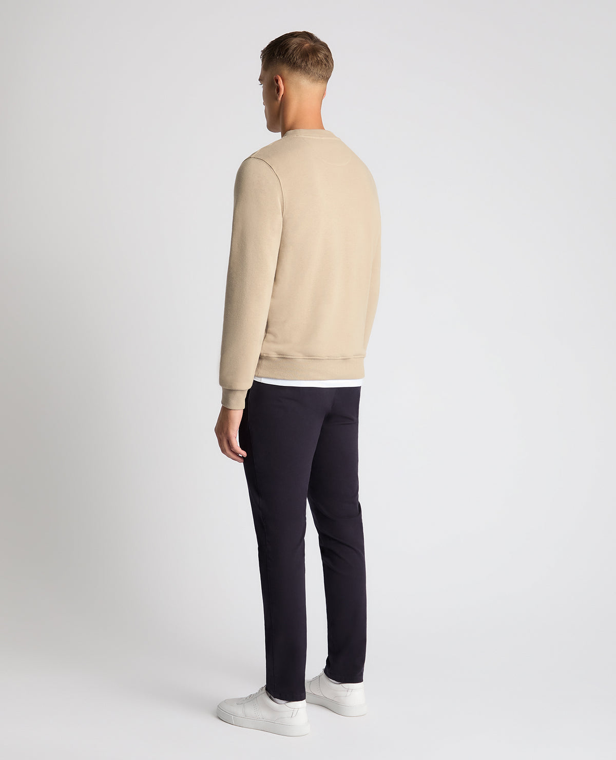 Man wearing a sand Tapered Fit Soft Touch Cotton-Blend Sweatshirt