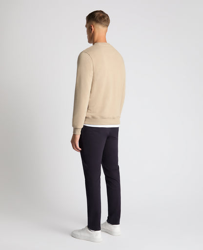 Man wearing a sand Tapered Fit Soft Touch Cotton-Blend Sweatshirt