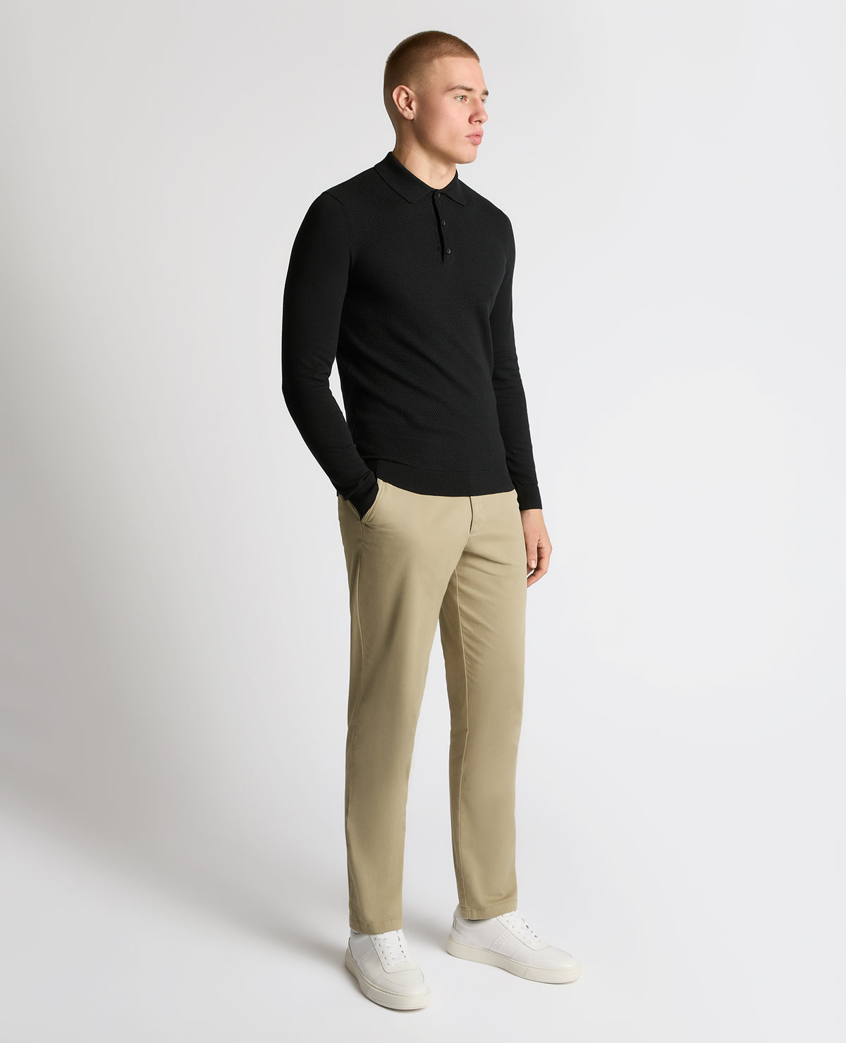 Man wearing a black Cotton Interest Fabric Knit Polo
