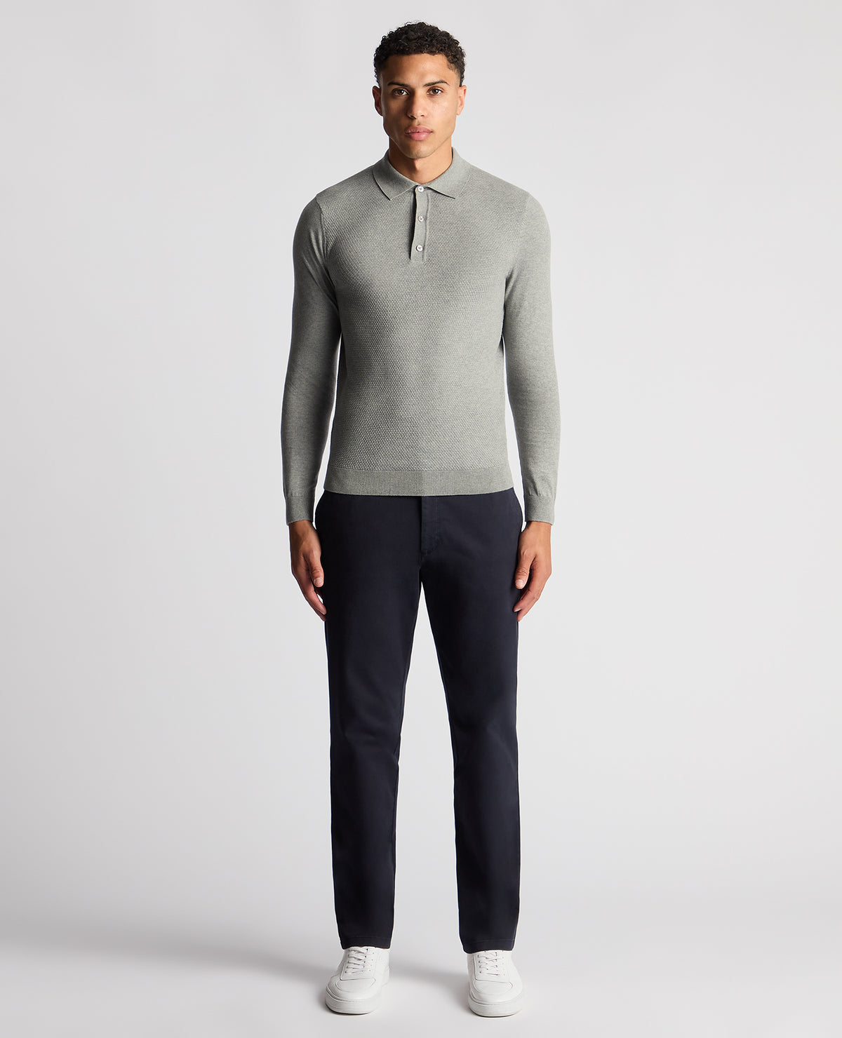 Man wearing a grey Slim Fit Cotton Knitted Polo