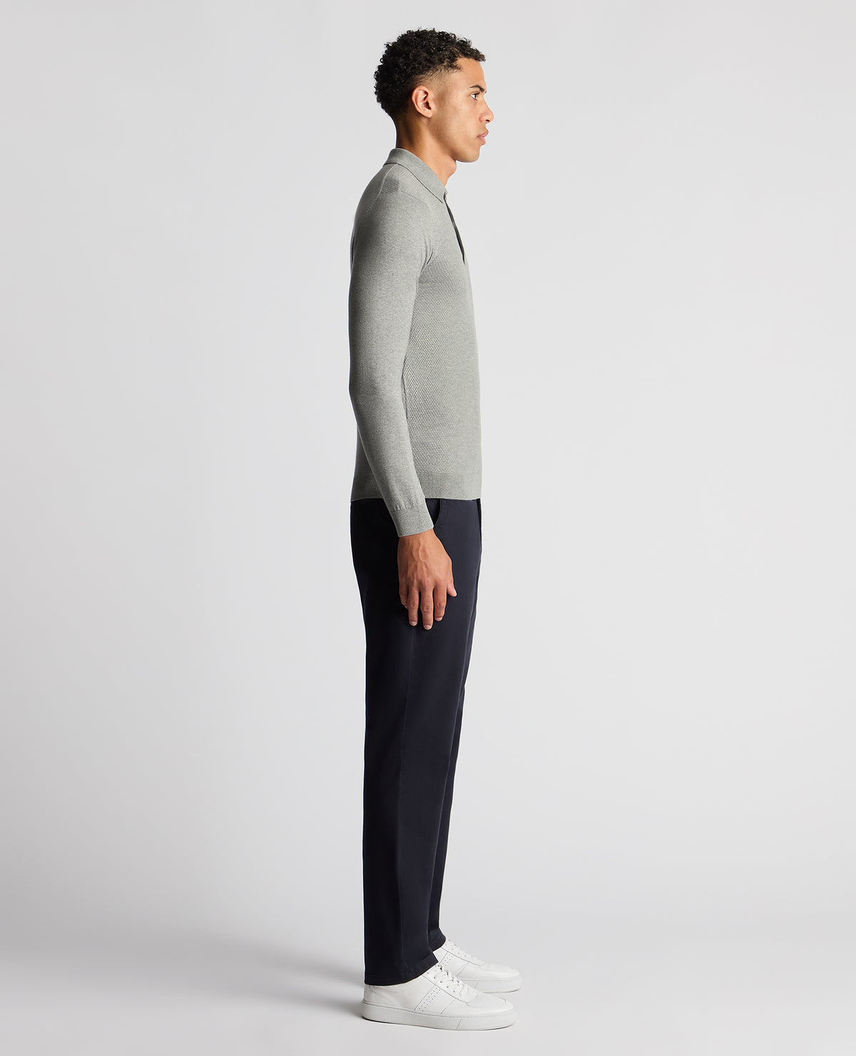 Man wearing a grey Slim Fit Cotton Knitted Polo