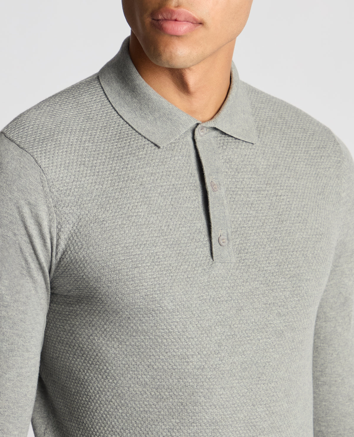 Man wearing a grey Slim Fit Cotton Knitted Polo