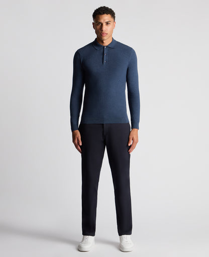 Man wearing a blue Slim Fit Cotton Knitted Polo