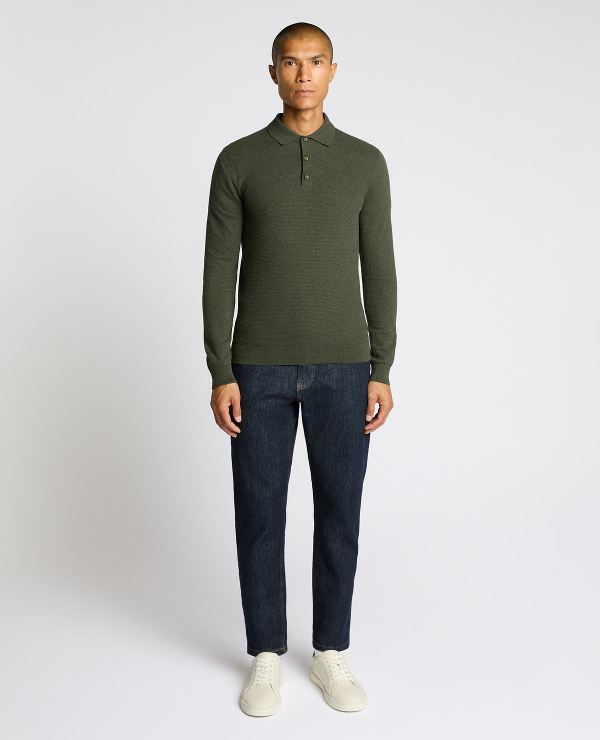 Man wearing a green Cotton Interest Fabric Knit Polo