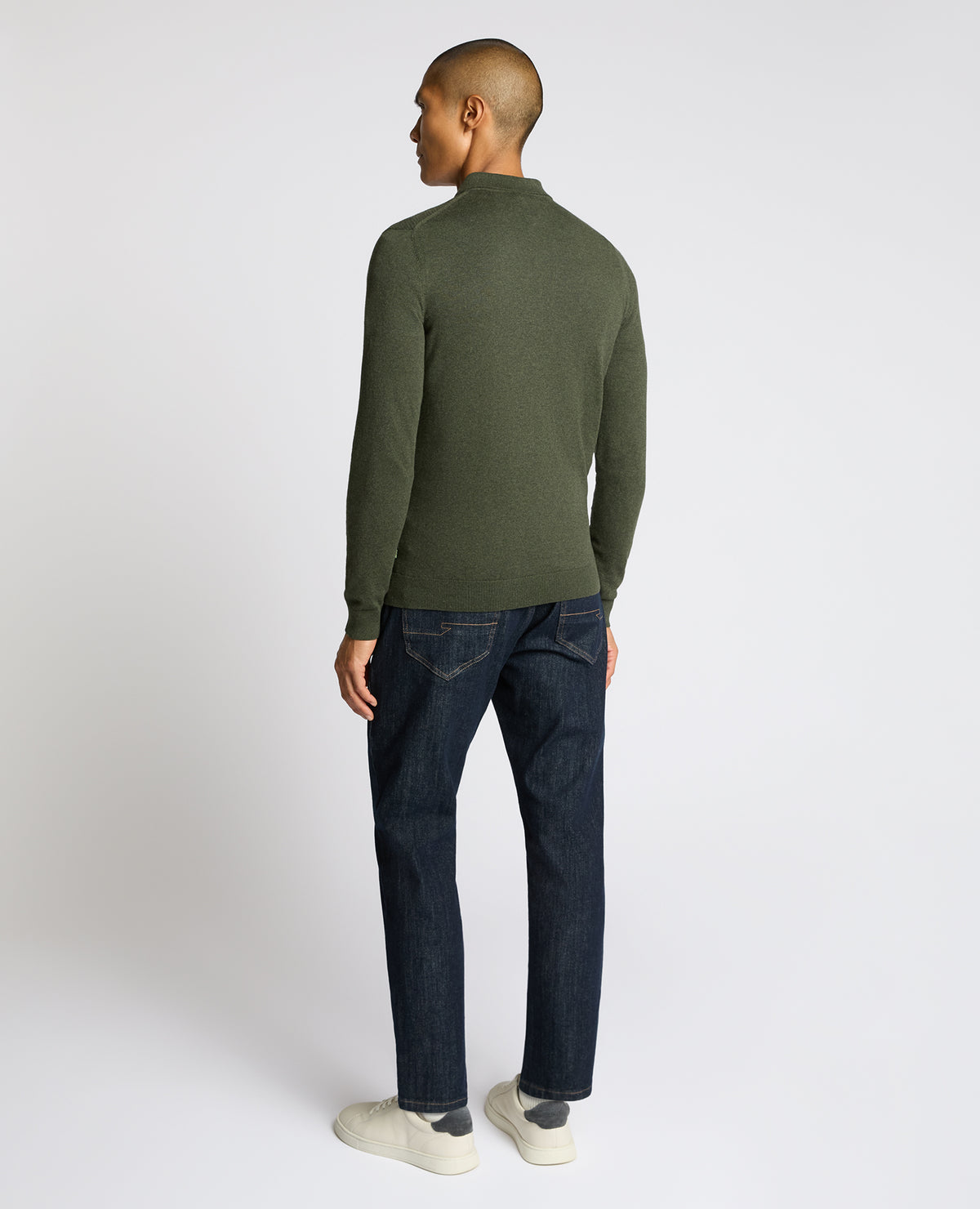 Man wearing a green Cotton Interest Fabric Knit Polo