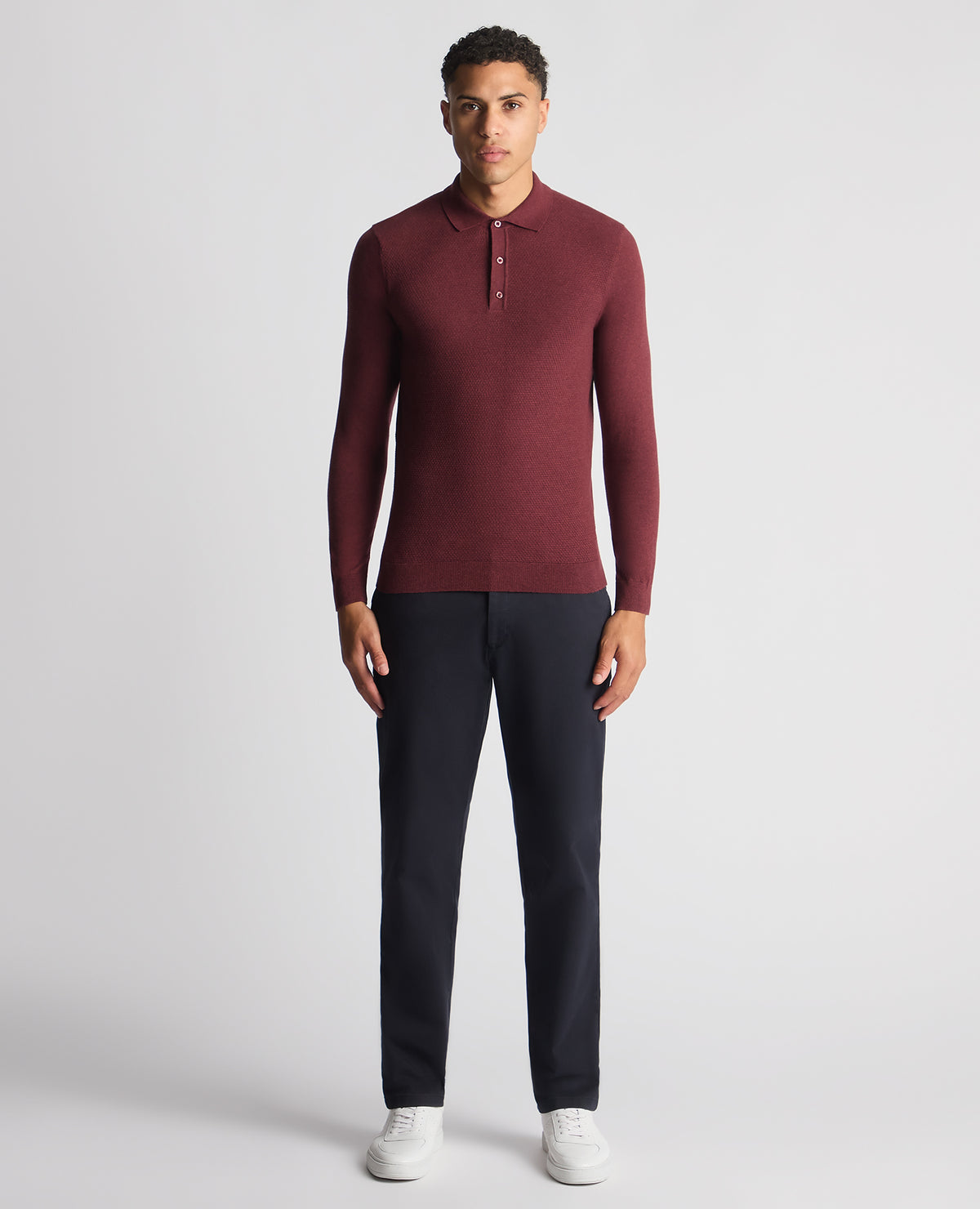 Man wearing a red Slim Fit Cotton Knitted Polo