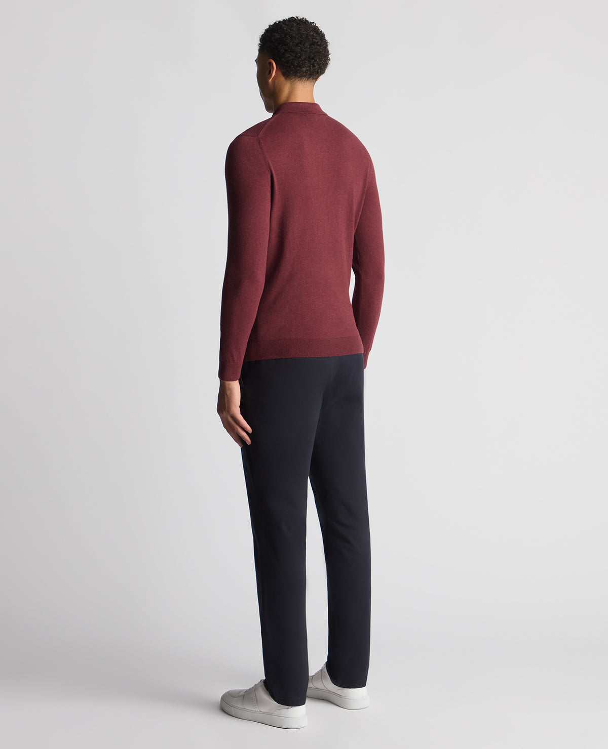 Man wearing a red Slim Fit Cotton Knitted Polo