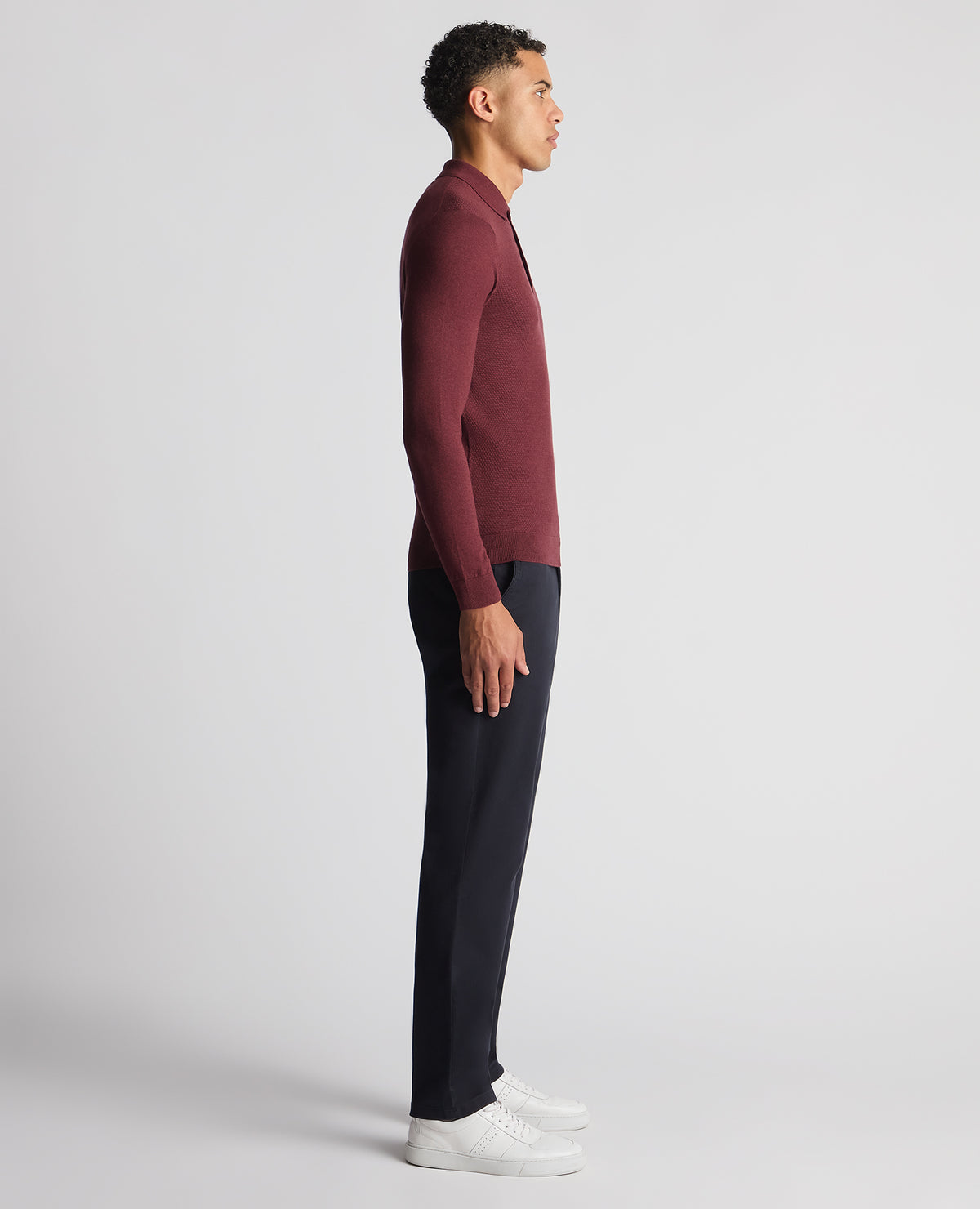 Man wearing a red Slim Fit Cotton Knitted Polo
