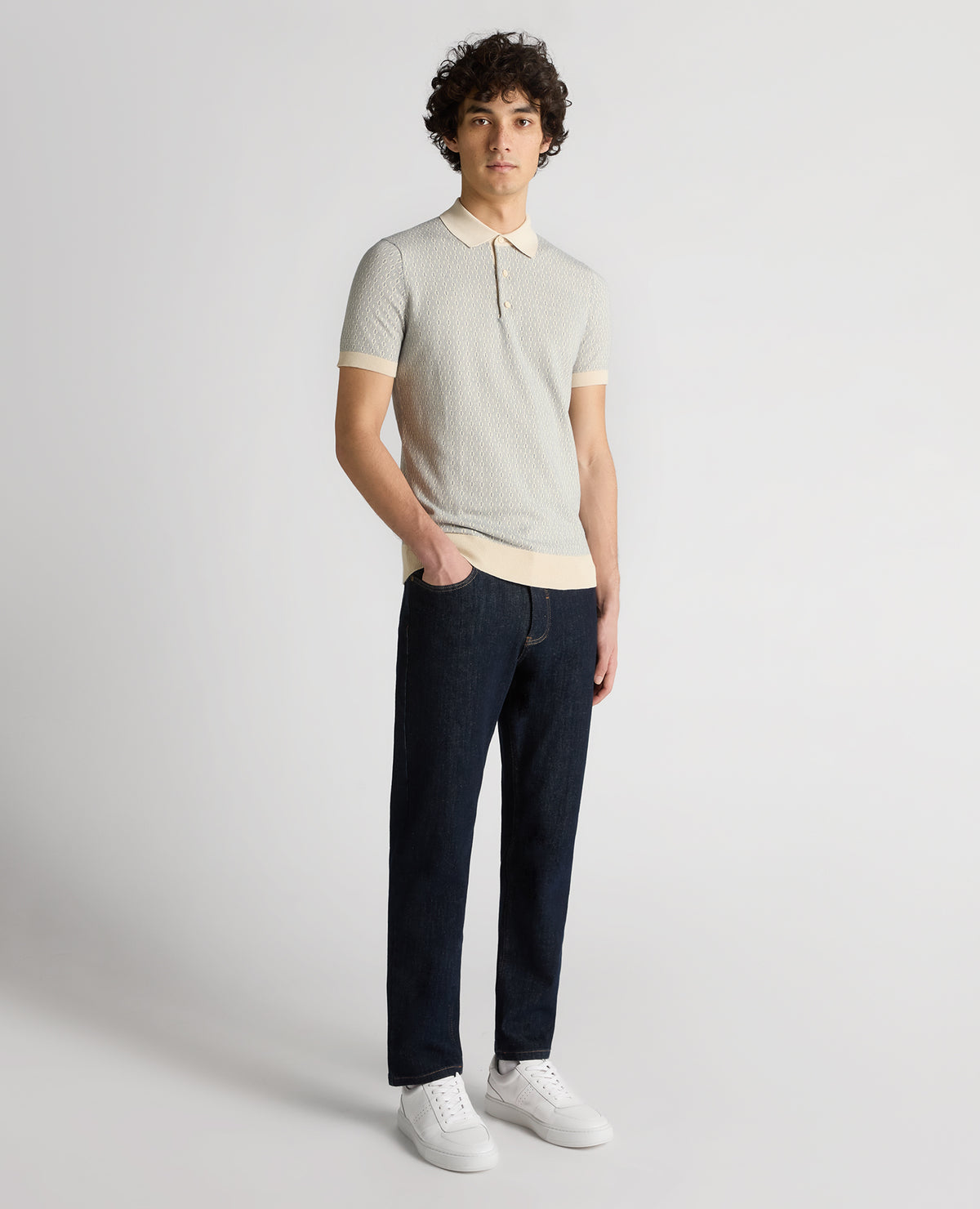 Man wearing a sand Slim Fit Cotton Geometric Polo Shirt