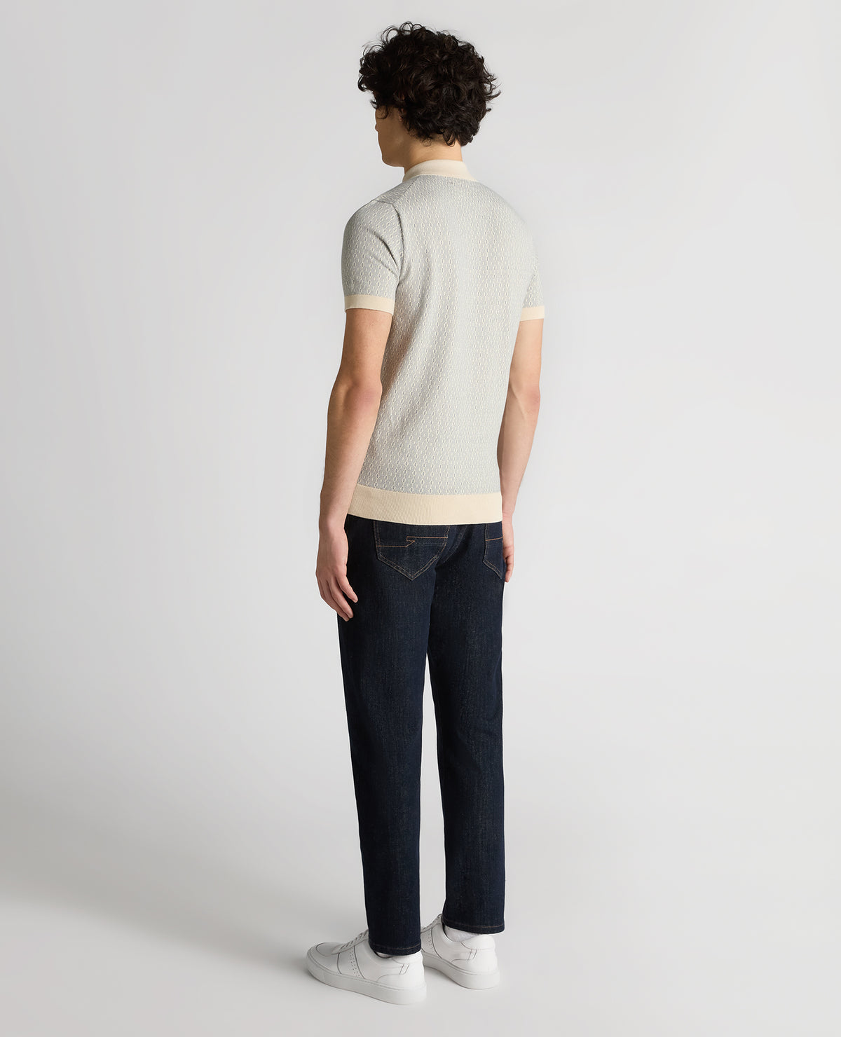 Man wearing a sand Slim Fit Cotton Geometric Polo Shirt