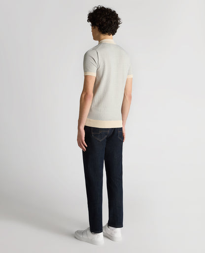Man wearing a sand Slim Fit Cotton Geometric Polo Shirt