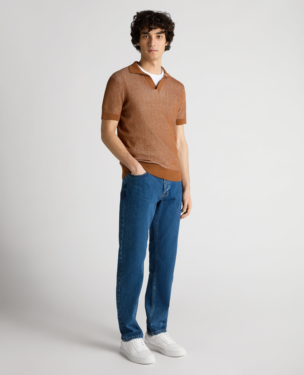 Man wearing a brown Slim Fit Textured Knit Polo