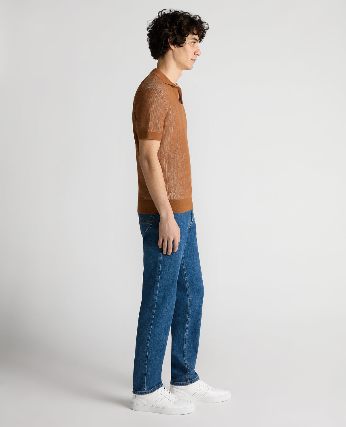 Man wearing a brown Slim Fit Textured Knit Polo