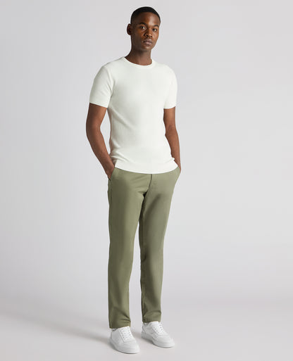 Man wearing a white Slim Fit Wafffle Knitted Tee