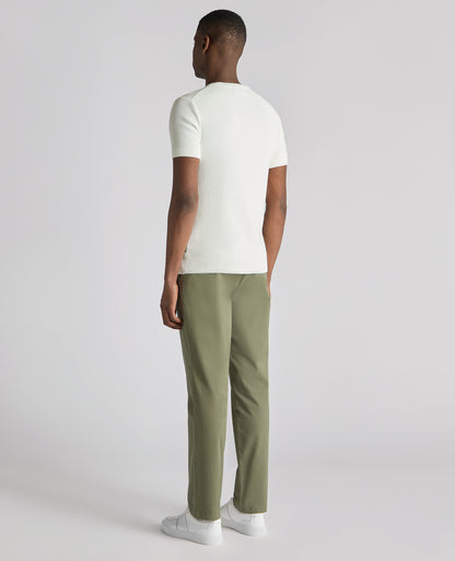 Man wearing a white Slim Fit Wafffle Knitted Tee