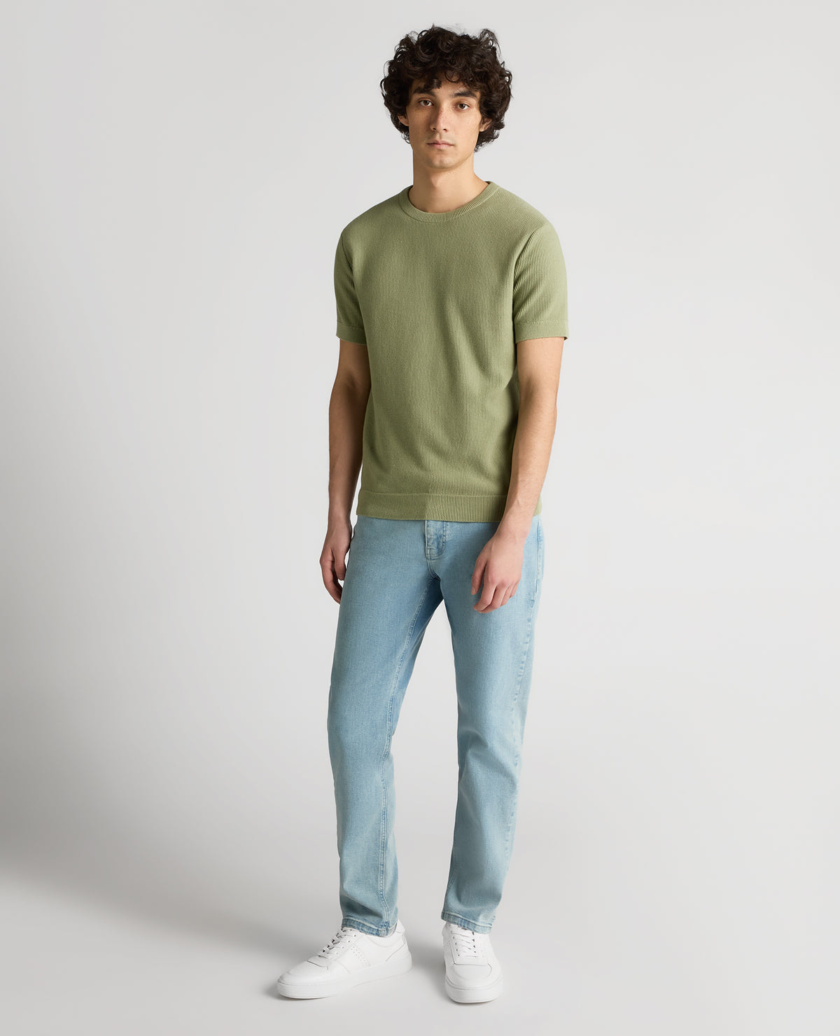 Man wearing a green Slim Fit Wafffle Knitted Tee