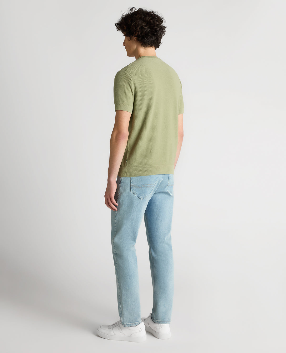 Man wearing a green Slim Fit Wafffle Knitted Tee
