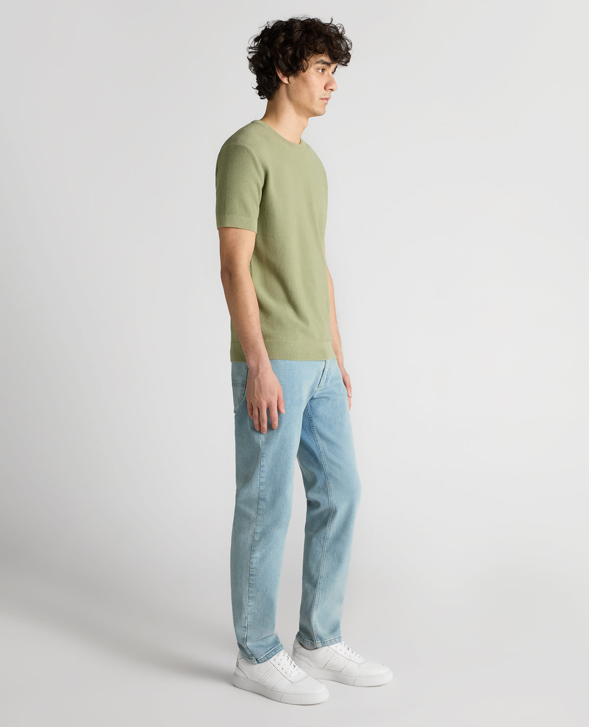 Man wearing a green Slim Fit Wafffle Knitted Tee