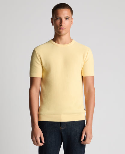 Man wearing a orange Slim Fit Wafffle Knitted Tee