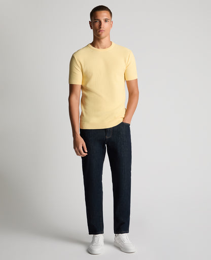 Man wearing a orange Slim Fit Wafffle Knitted Tee