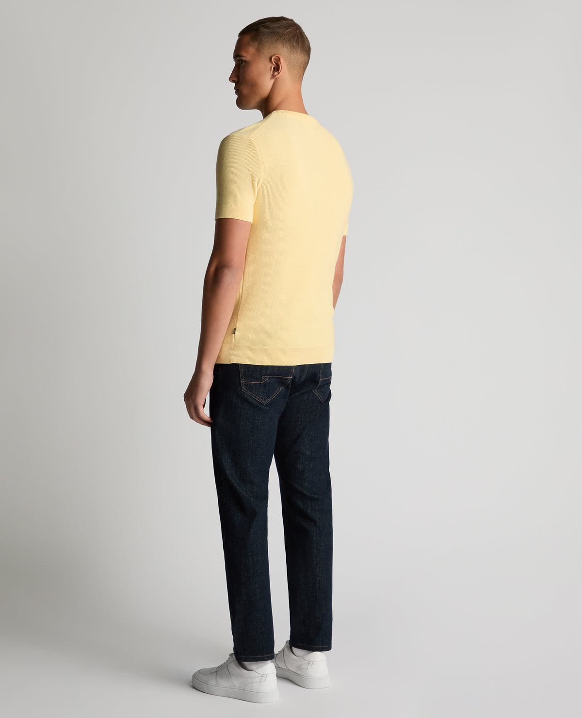 Man wearing a orange Slim Fit Wafffle Knitted Tee