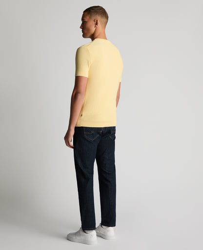 Man wearing a orange Slim Fit Wafffle Knitted Tee