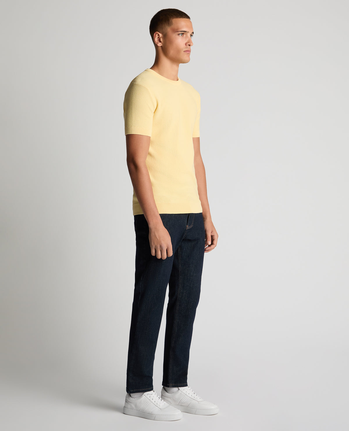 Man wearing a orange Slim Fit Wafffle Knitted Tee