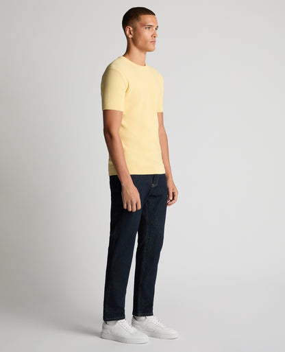 Man wearing a orange Slim Fit Wafffle Knitted Tee